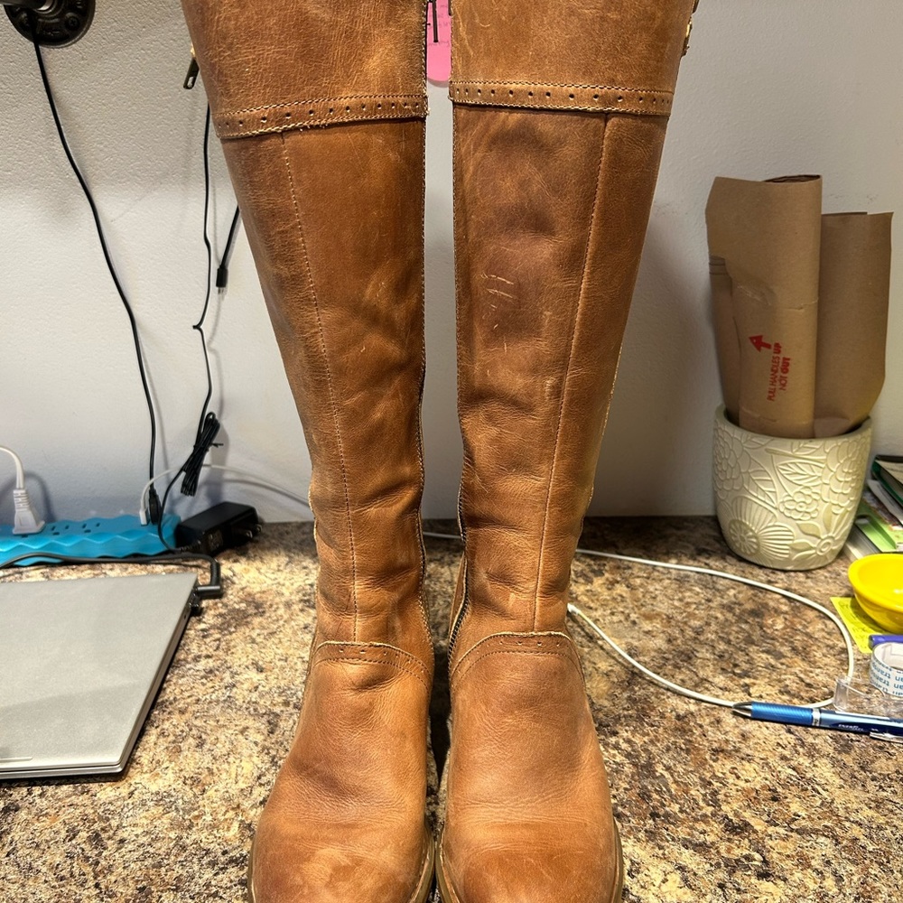 Born tall boots. Only worn once, then just sat in closet for a couple years.